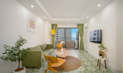 Mường Thanh Apartment Кухня с миской, ложкой, палочками для еды, сковородкой,