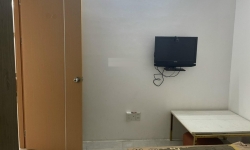 Mường Thanh Viễn Triều Phòng ngủ đầy đủ tiện nghi với chăn và gối,